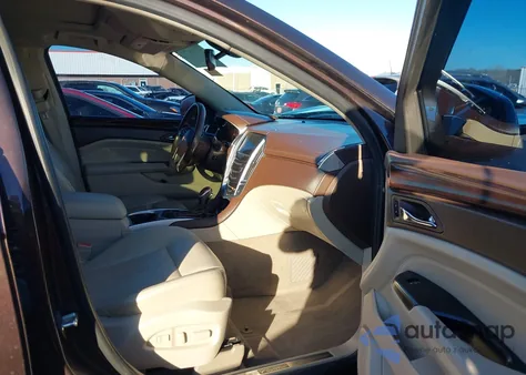 2015 Cadillac Srx Luxury Collection z USA, uszkodzony, nr VIN 3GYFNBE38FS530321